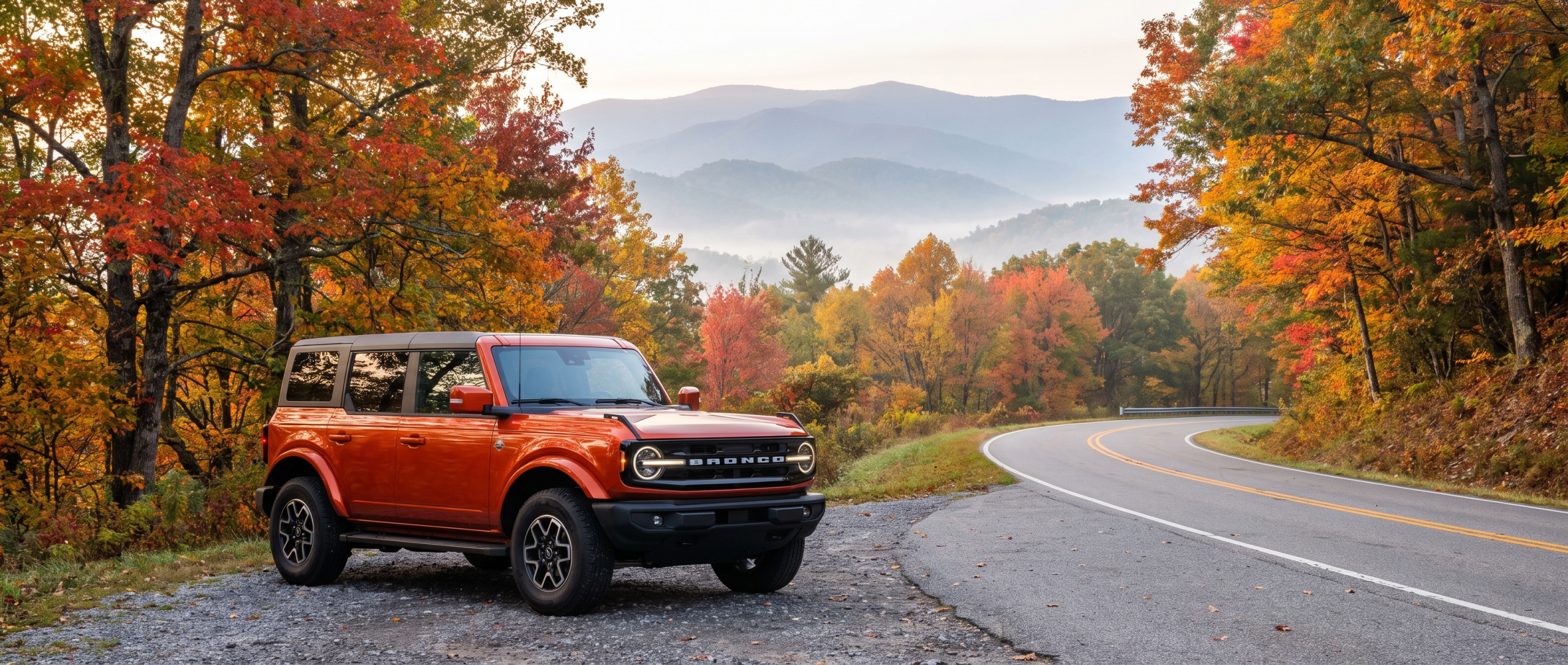 Ford Bronco on Highway 11 scenic drive near Greer, SC with Blue Ridge Mountain views