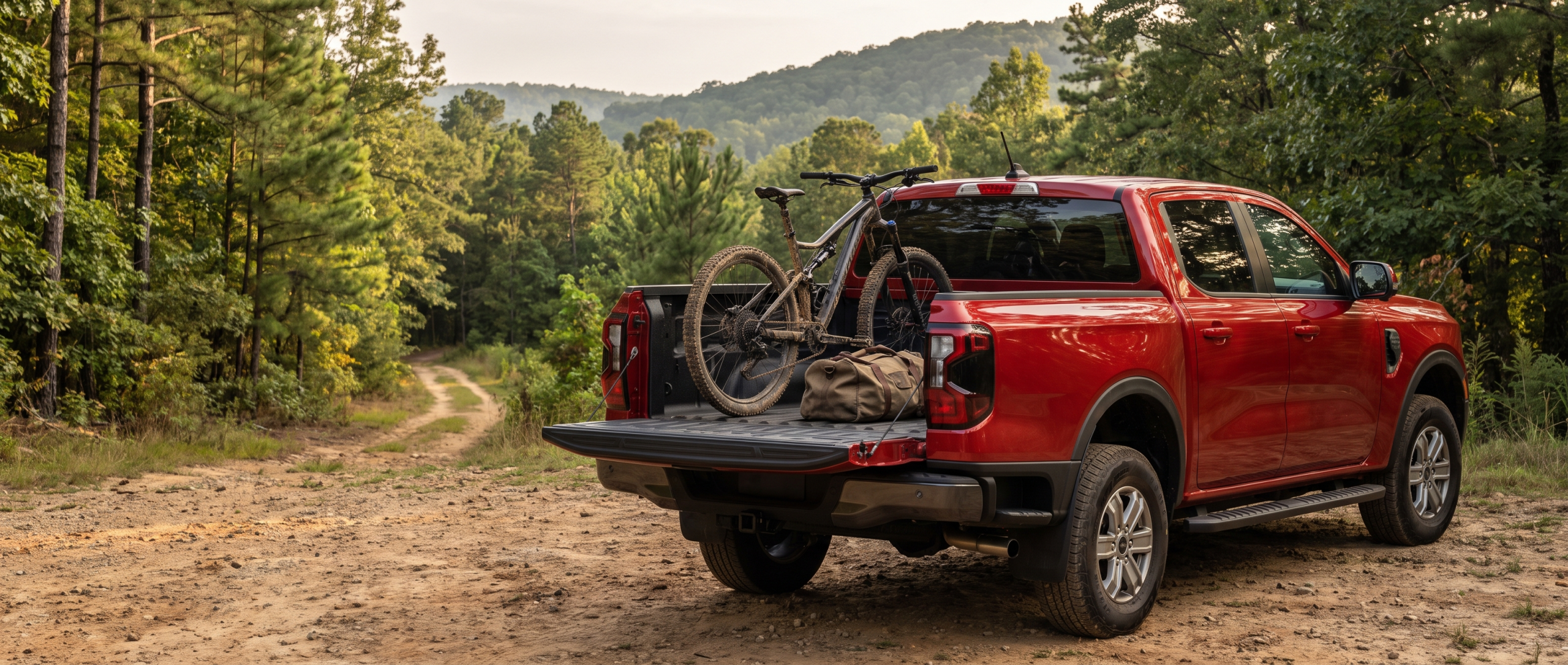 2026 Ford Ranger XLT at a South Carolina foothills trailhead with tailgate down and a mountain bike in the bed