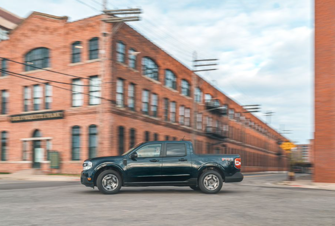 A 2022 Ford Maverick driving through the city.